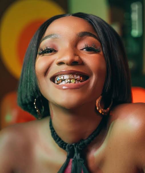 “I forgot to do BBl before recording” – Simi claps back at a troll that body shamed her for wearing a bikini
